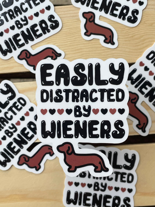EASILY DISTRACTED BY WIENERS STICKER